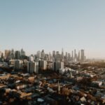 city skyline under blue sky during daytime